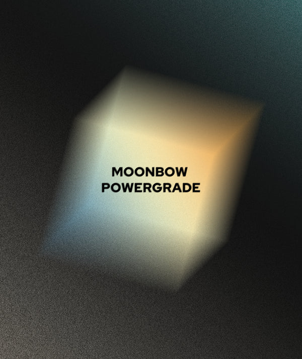A glowing translucent cube centered on a dark textured background with the text 'MOONBOW POWERGRADE' printed on it.